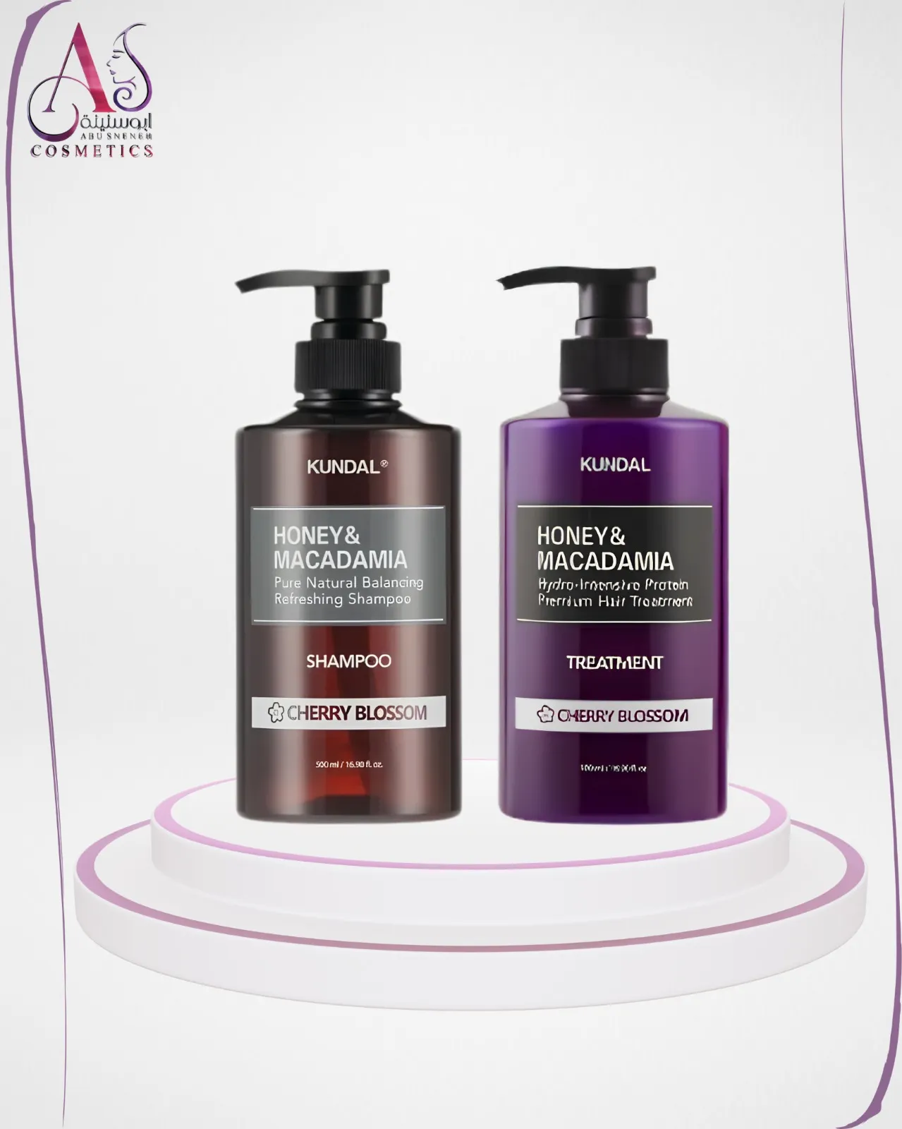 KUNDAL cherry blossom shampoo and conditioner bottles surrounded by delicate pink cherry blossom petals on a light background